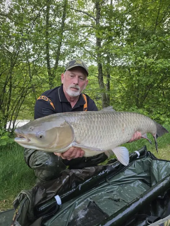 Pete with his first fish of the session - 31:8 grass carp